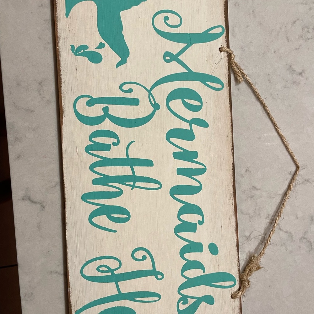 “Mermaids bathe here” cute bathroom sign